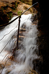 Image showing Waterfall overflowing onto the cliff side steps