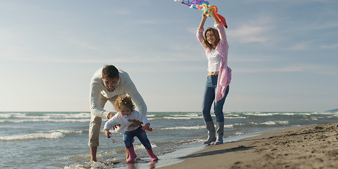 Image showing Young family enjoying vecation during autumn