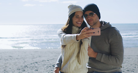 Image showing Gorgeous couple taking picture of herselfe