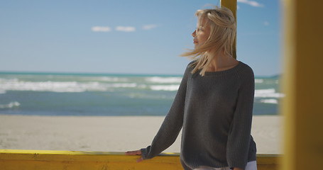 Image showing Young woman enjoying the warm autumn day