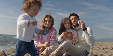 Image showing Young family enjoying vecation during autumn