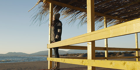 Image showing Young woman enjoying the warm autumn day