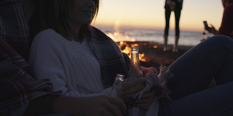 Image showing Friends having fun at beach on autumn day