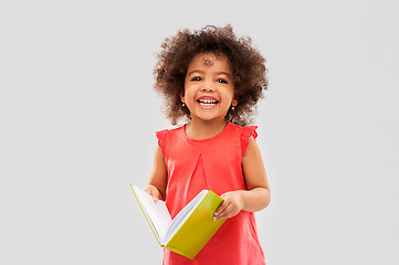 Image showing happy little african american girl with book