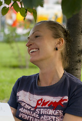 Image showing  laughing woman under the tree