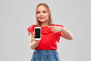 Image showing beautiful smiling girl showing smartphone