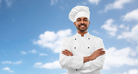 Image showing happy male indian chef in toque