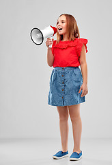 Image showing smiling girl speaking to megaphone