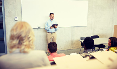 Image showing students and teacher with tablet pc at lecture