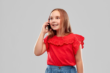 Image showing beautiful smiling girl calling on smartphone