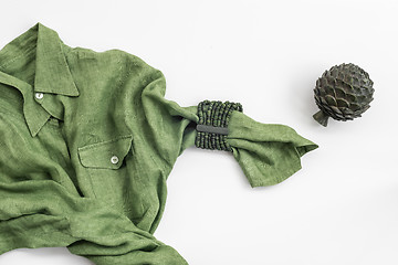 Image showing Green shirt and metal artichoke