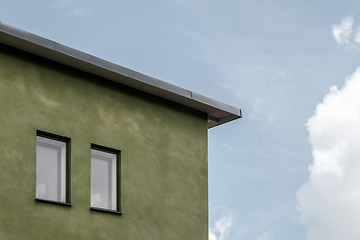 Image showing Green house against blue sky