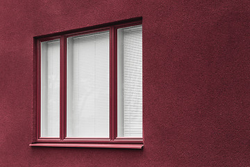 Image showing Window of a cherry red building