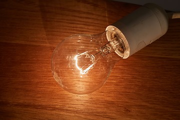 Image showing Light bulb on a table