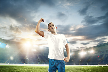 Image showing Young boy as winner at stadium