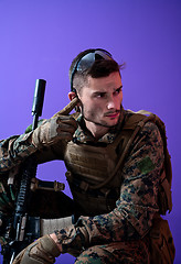 Image showing soldier  checking communication