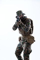 Image showing soldier in action aiming laseer sight optics