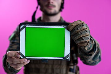 Image showing soldier showing a tablet with a blank green screen