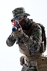 Image showing soldier in action aiming laseer sight optics