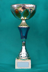 Image showing Champion cup with reflection on green background