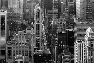 Image showing New York City skyline with urban skyscrapers at sunset, USA.