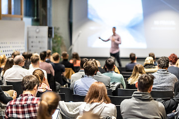 Image showing Business speaker giving a talk at business conference event.