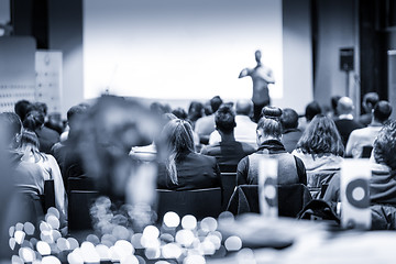 Image showing Male public peaker giving presentation on business conference event.