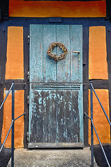 Image showing Blue door entrance on a retro facade