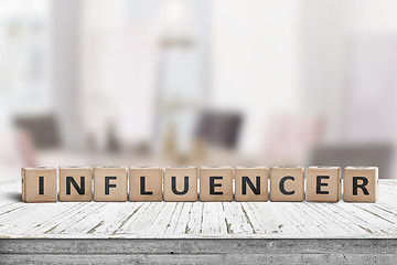 Image showing Influencer sign on a wooden table