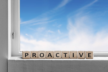 Image showing Proactive sign in a window sill on a bright day