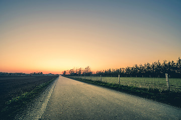 Image showing Road to a sunset in a rural environment