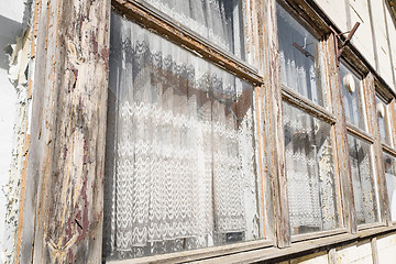 Image showing Old wooden windows on a row