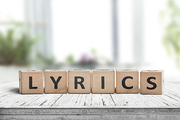 Image showing Lyrics sign on a table in a bright room