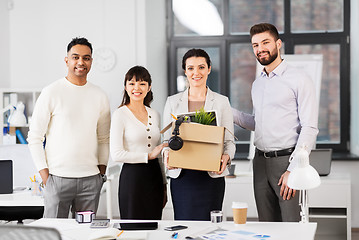 Image showing new female employee with colleagues at office