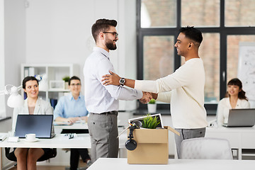 Image showing new male employee meeting colleagues at office