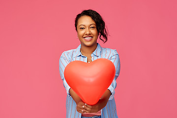 Image showing african american woman with heart-shaped balloon