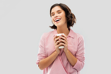 Image showing woman drinking takeaway coffee in paper cup