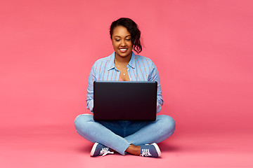 Image showing happy african american woman with laptop computer