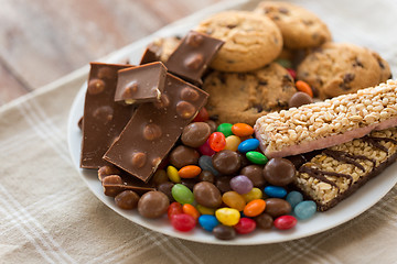 Image showing chocolate, cookies, candies and muesli bars