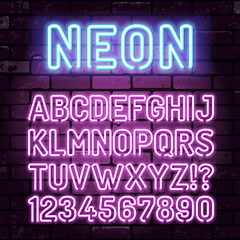 Image showing Purple Neon Alphabet on Brick Wall