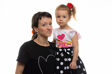 Image showing Portrait of a mother with a four-year-old daughter on a white background