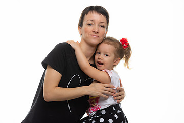 Image showing Mom and daughter hugged each other, isolated on a white background