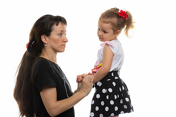 Image showing Mother looks at her daughter with discontent