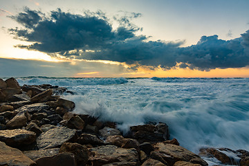 Image showing Seascape on rocky shore in storm