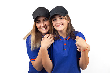 Image showing Portrait of two happy women, mother and daughter in blue T-shirts