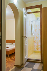 Image showing Entrance to a small guest room at the hotel