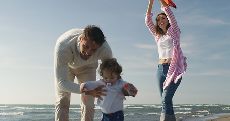 Image showing Young family enjoying vecation during autumn