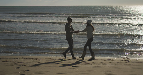 Image showing Romantic Couple Relaxing On The Beach