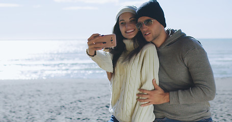 Image showing Gorgeous couple taking picture of herselfe