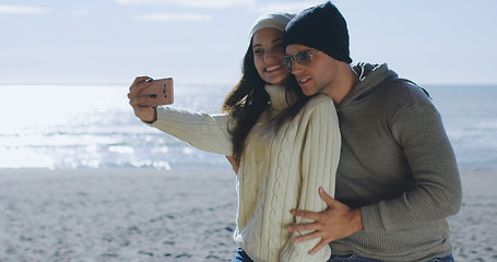 Image showing Gorgeous couple taking picture of herselfe